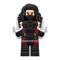 Superhero Elektra brick minifigure on white background