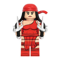 Superhero Elektra brick minifigure on white background